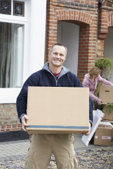 Student removals team handling boxes and furniture in Wimbledon