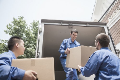Team reviewing health and safety procedures for a move