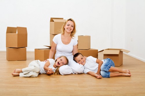 Packed office equipment and furniture ready for transport