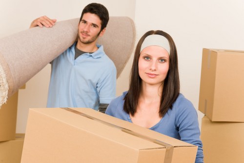 Crew separating cardboard and wood for recycling