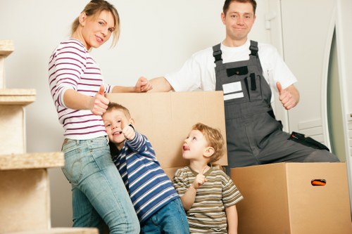 Movers handling a scheduled office relocation with care